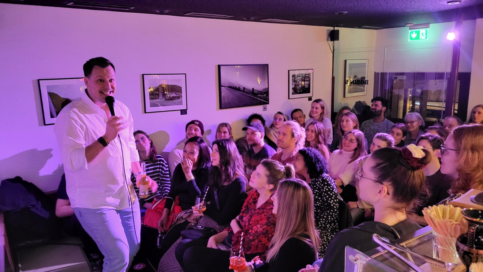 IN YOUR FACE Comedy, the audience laughing at a live English stand-up comedy show in Zürich (2024)