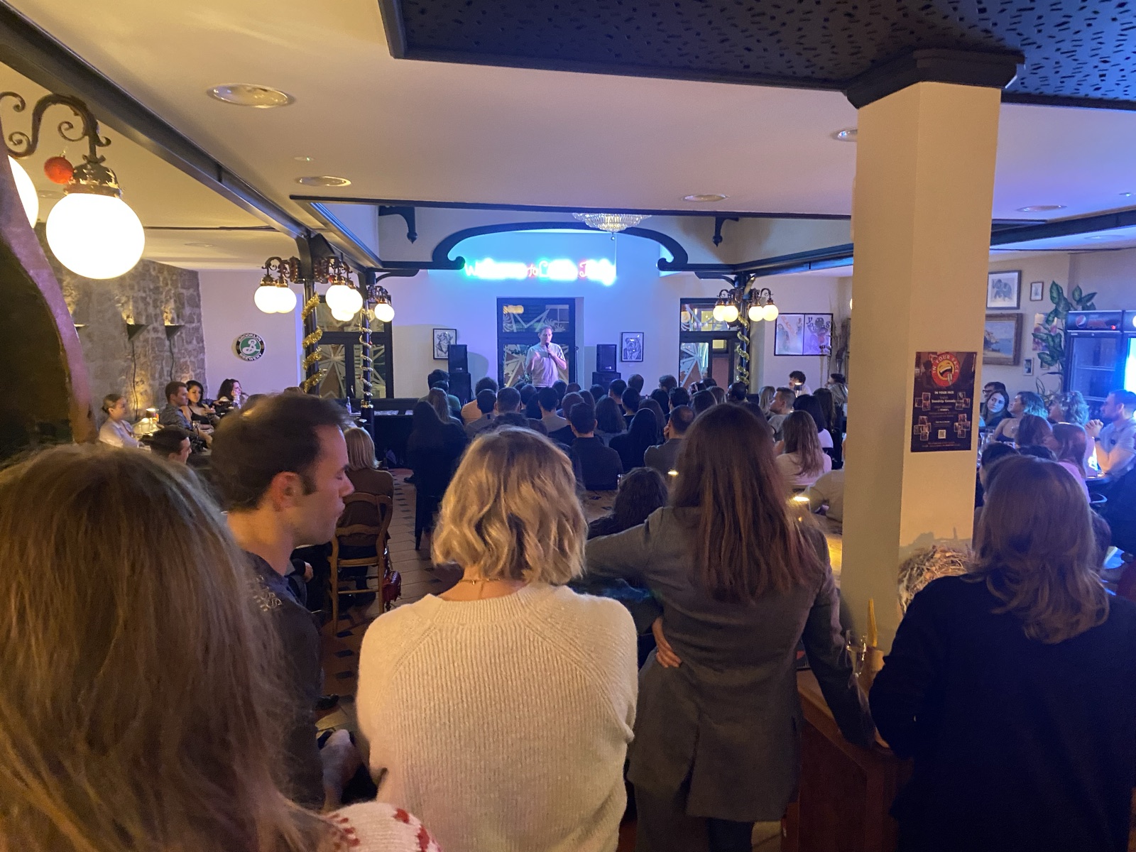IN YOUR FACE Comedy, the audience at a live English stand-up comedy show in Zürich (2023)
