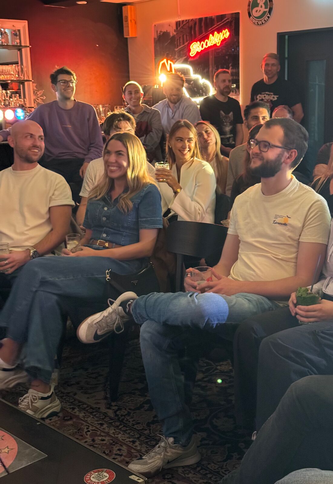 IN YOUR FACE Comedy, a packed audience laughing at a live English stand-up comedy show in Zürich (2026)
