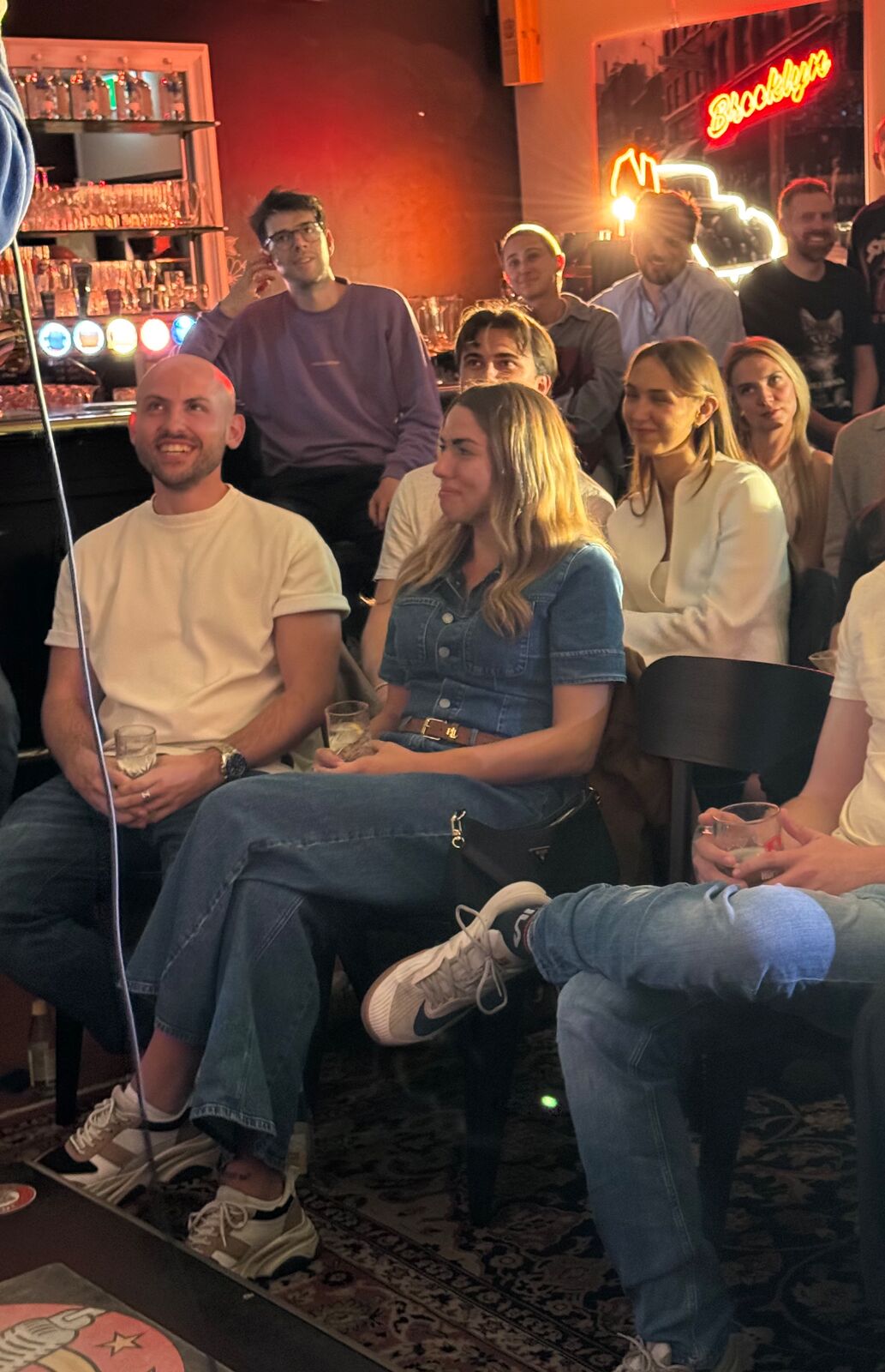 IN YOUR FACE Comedy, a packed audience laughing at a live English stand-up comedy show in Zürich (2026)