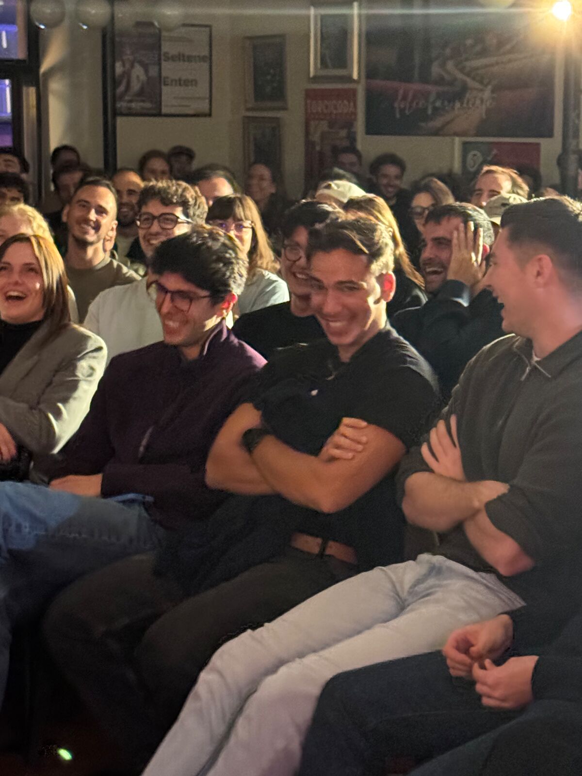 IN YOUR FACE Comedy, a packed audience laughing at a live English stand-up comedy show in Zürich (2026)