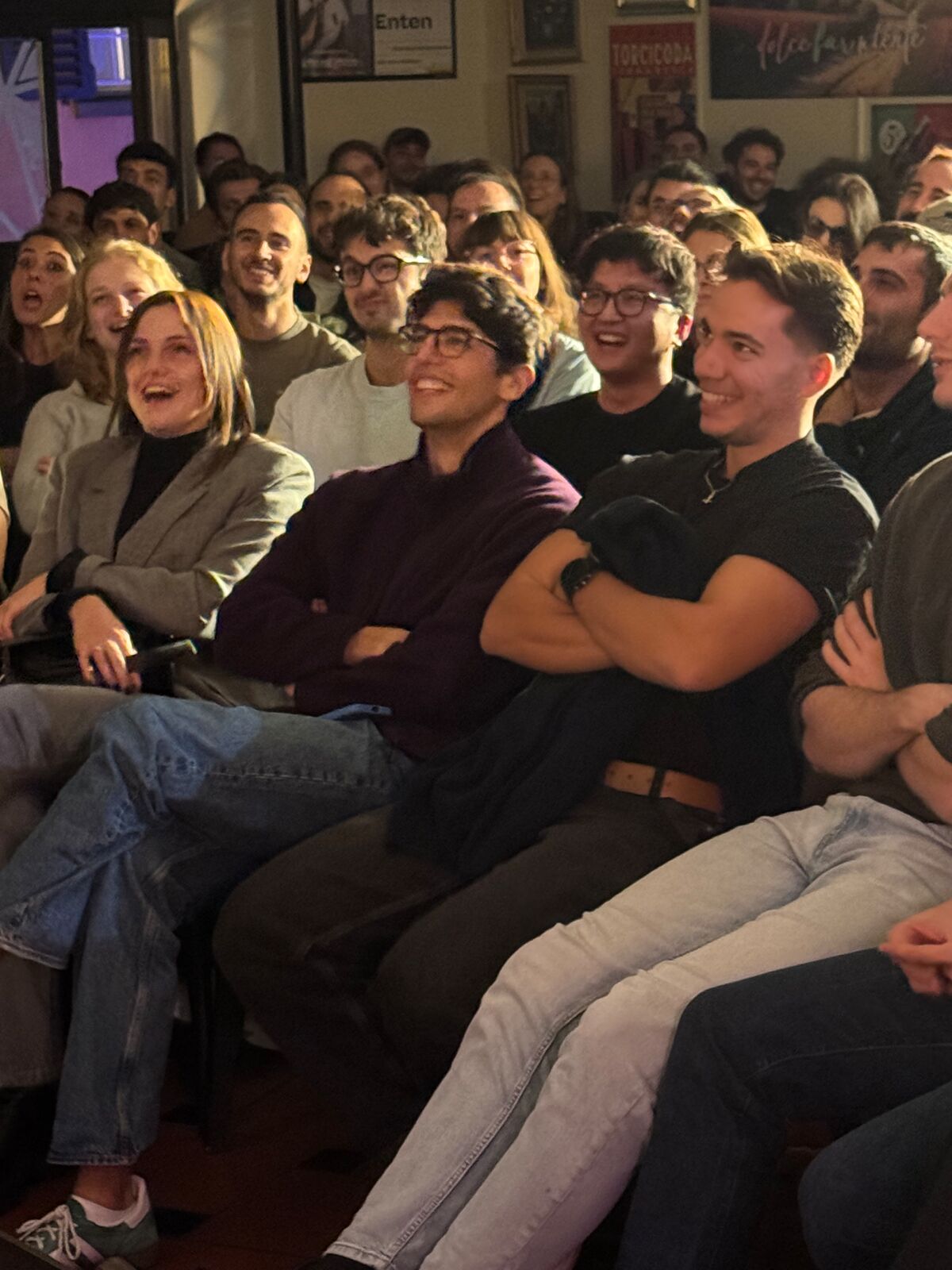 IN YOUR FACE Comedy, a packed audience laughing at a live English stand-up comedy show in Zürich (2026)