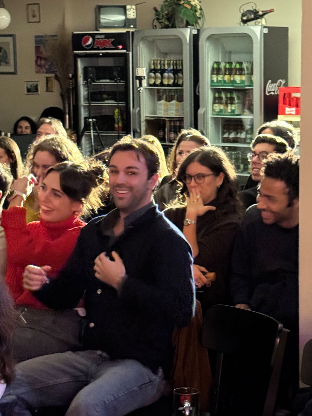 IN YOUR FACE Comedy, a packed audience laughing at a live English stand-up comedy show in Zürich (2026)