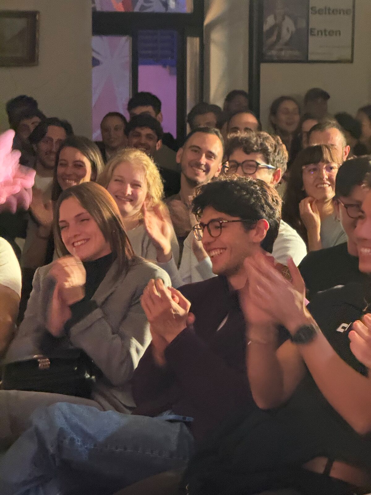 IN YOUR FACE Comedy, a packed audience laughing at a live English stand-up comedy show in Zürich (2026)