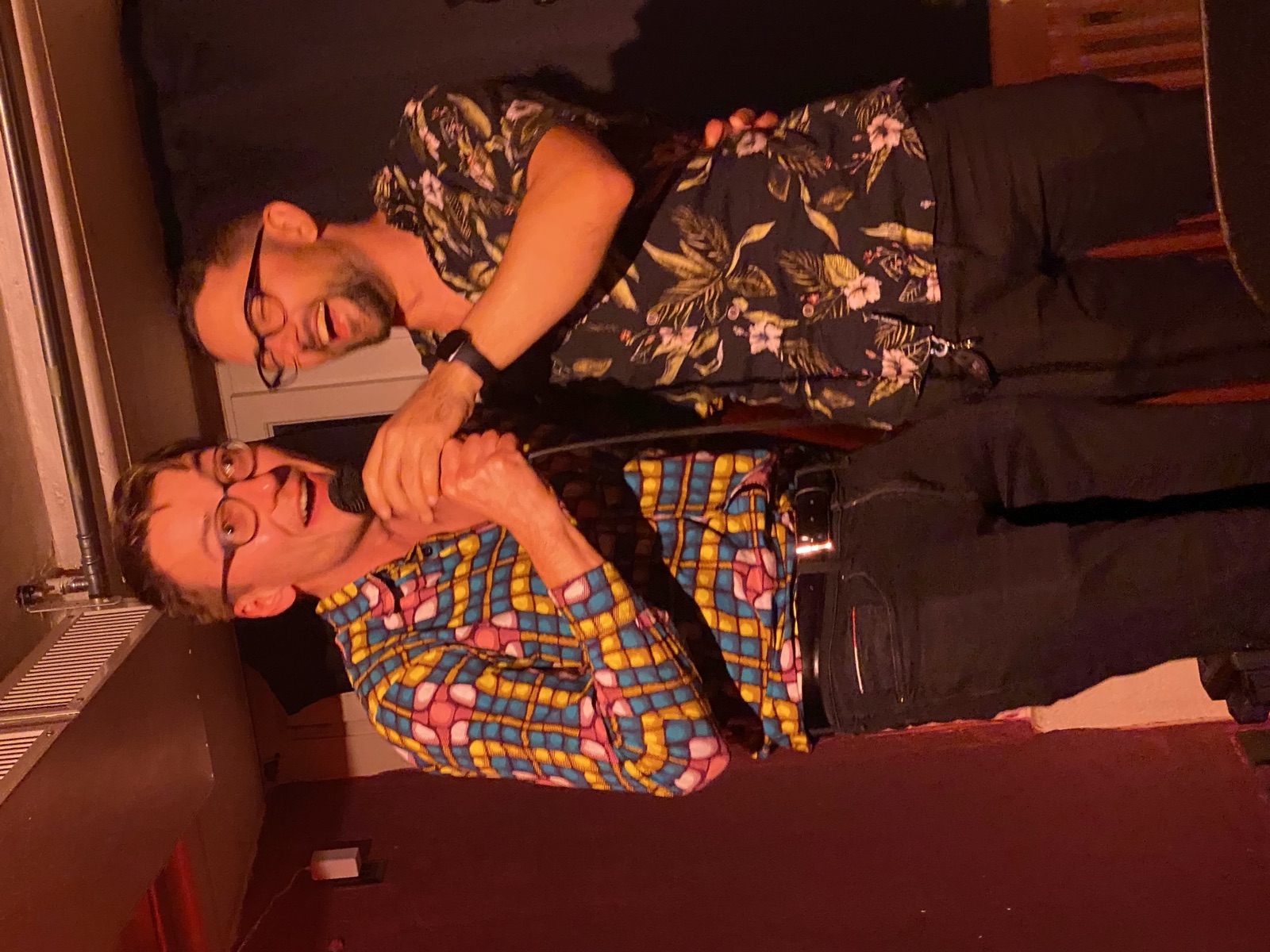 Woocash performing stand-up at IN YOUR FACE Comedy in Zürich