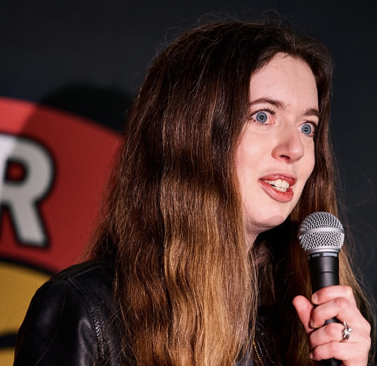 Martina performing stand-up at IN YOUR FACE Comedy in Zürich