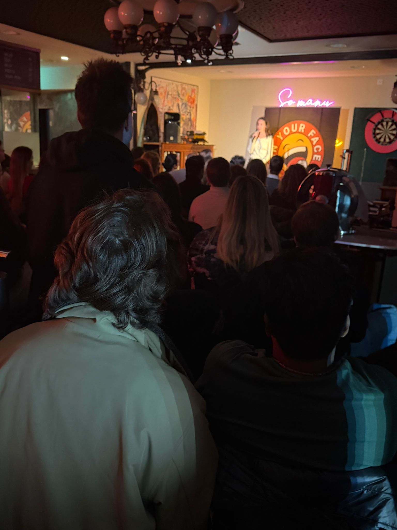 IN YOUR FACE Comedy, the audience at a live English stand-up comedy show in Zürich (2026)