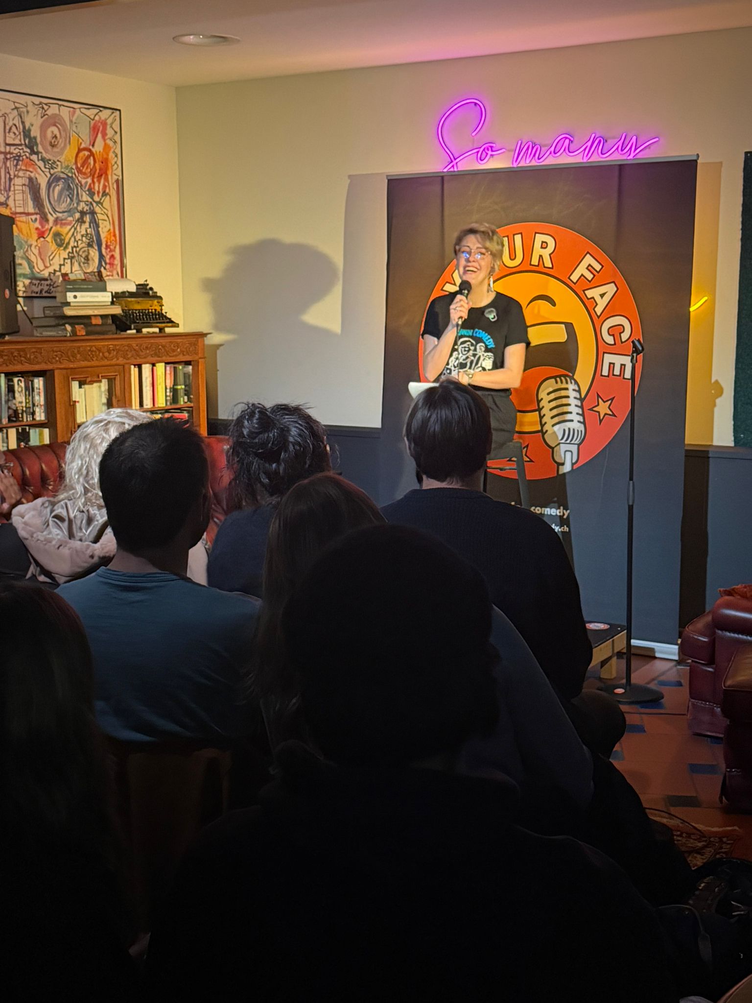 Zeina performing stand-up at IN YOUR FACE Comedy in Zürich